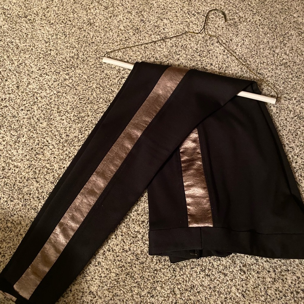 Black slacks with stripe